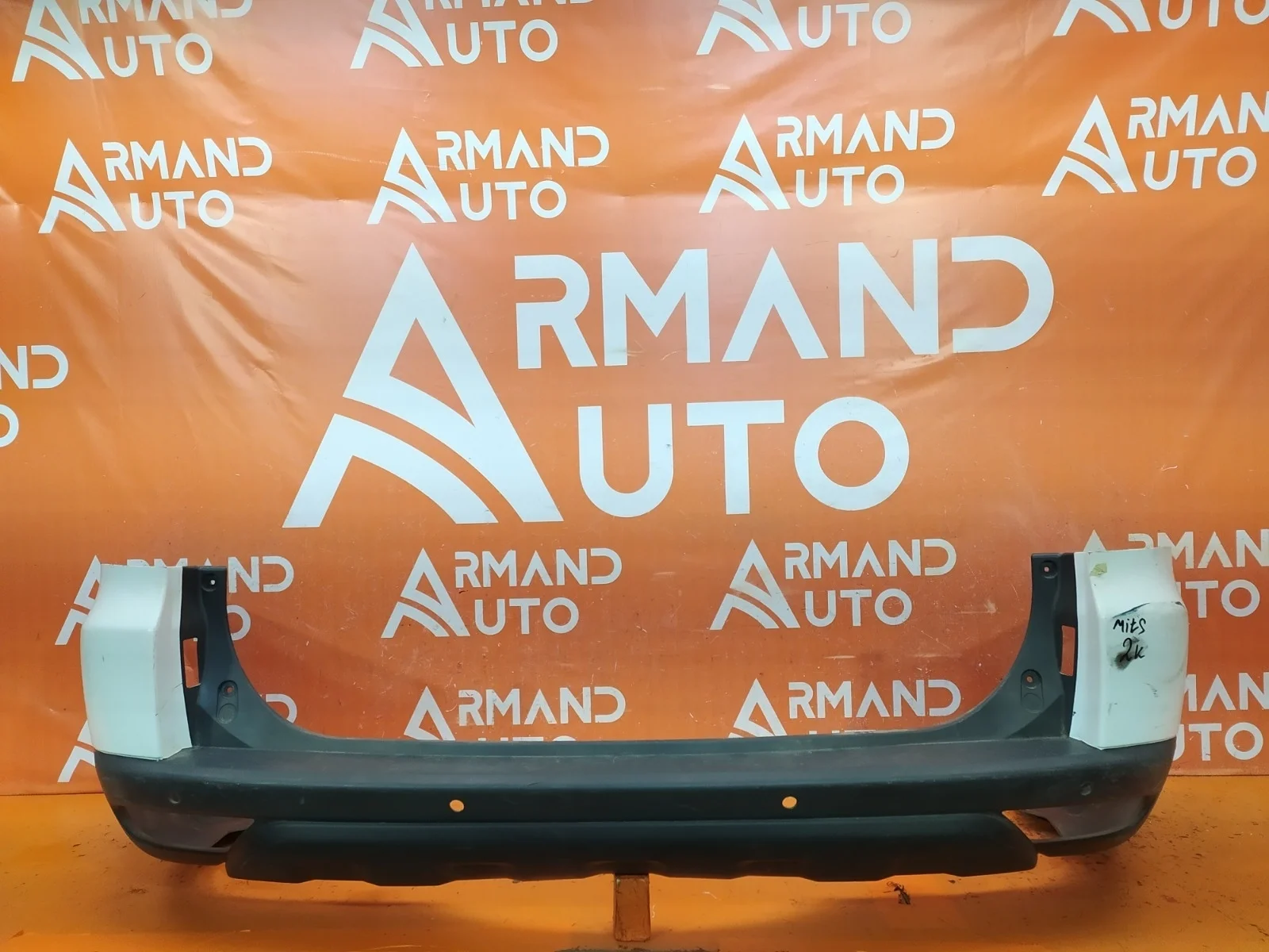 Бампер Mitsubishi Pajero sport 2008-2016