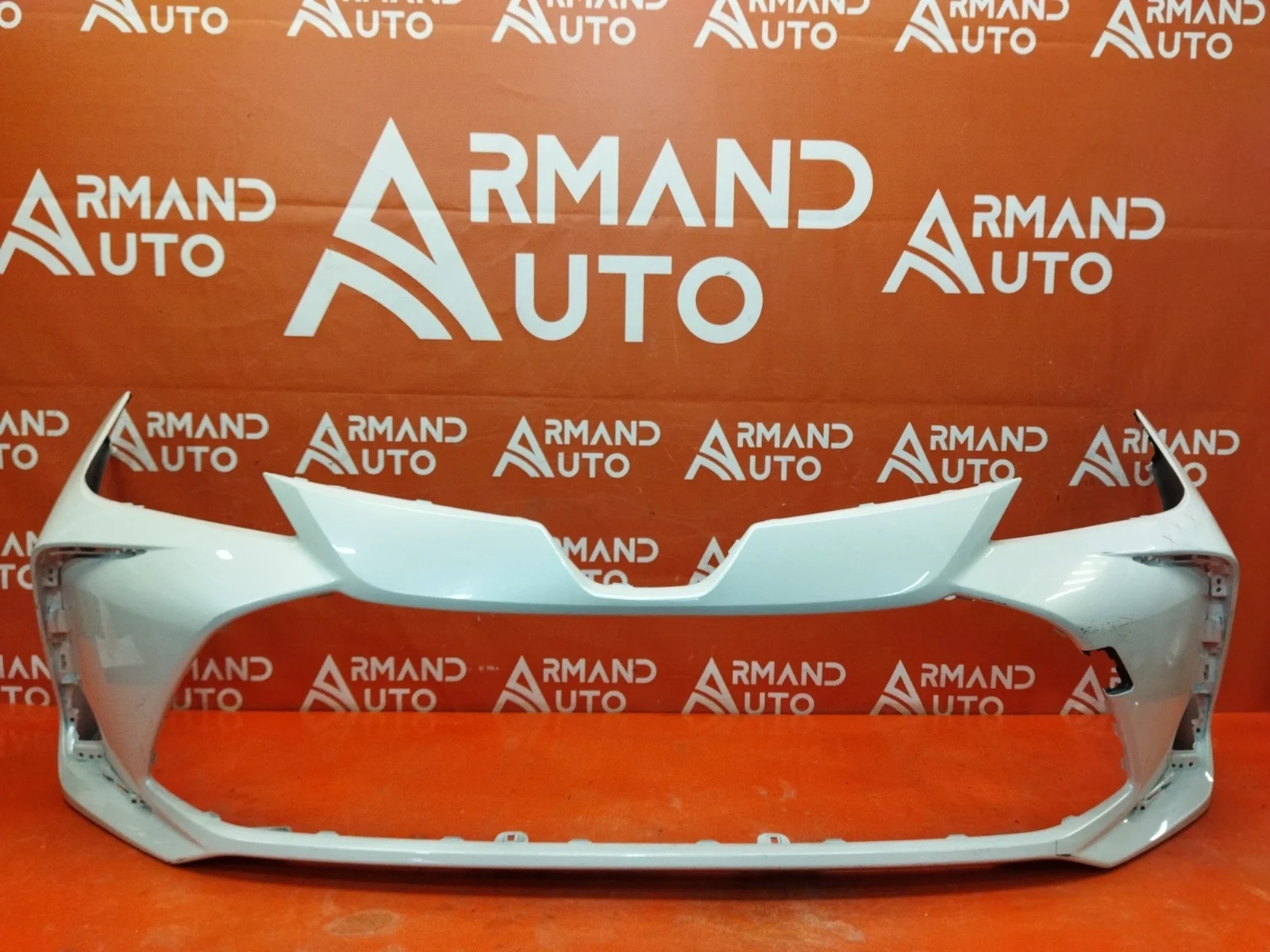 Бампер Toyota Corolla 2018-нв 12 E210