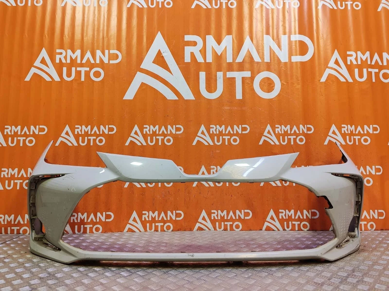 Бампер Toyota Corolla 2018-нв 12 E210