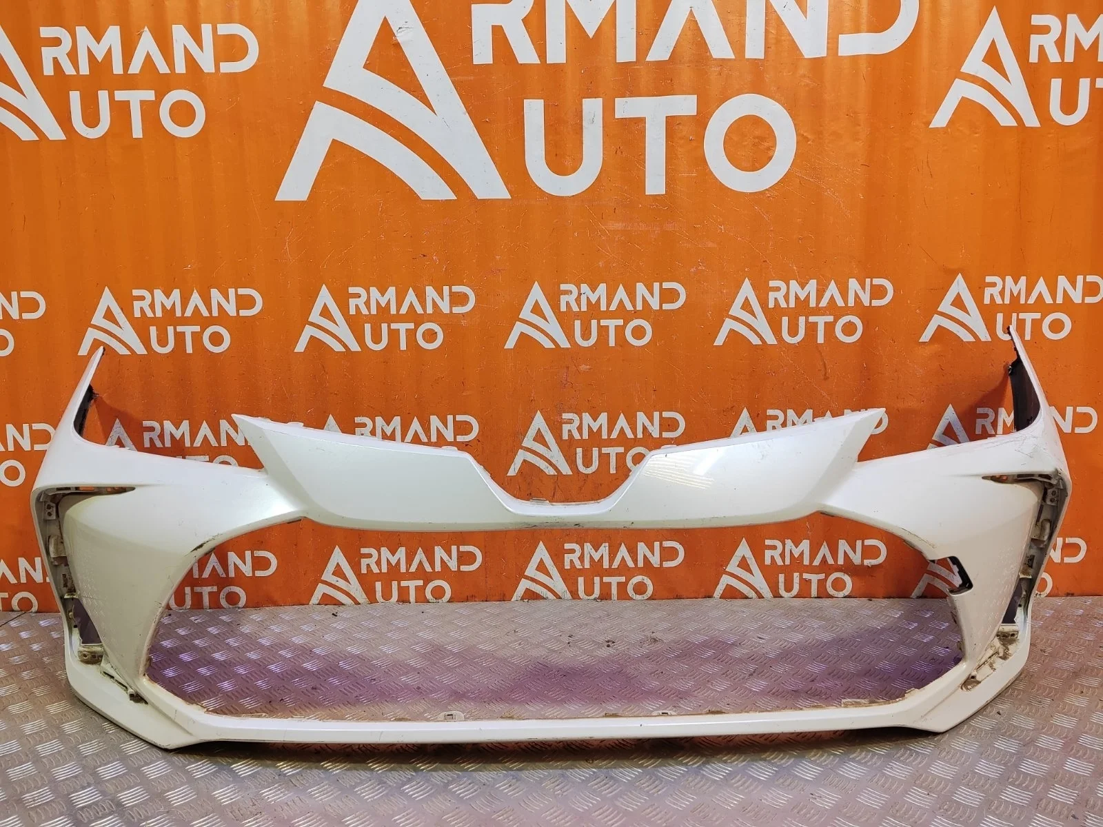 Бампер Toyota Corolla 2018-нв 12 E210