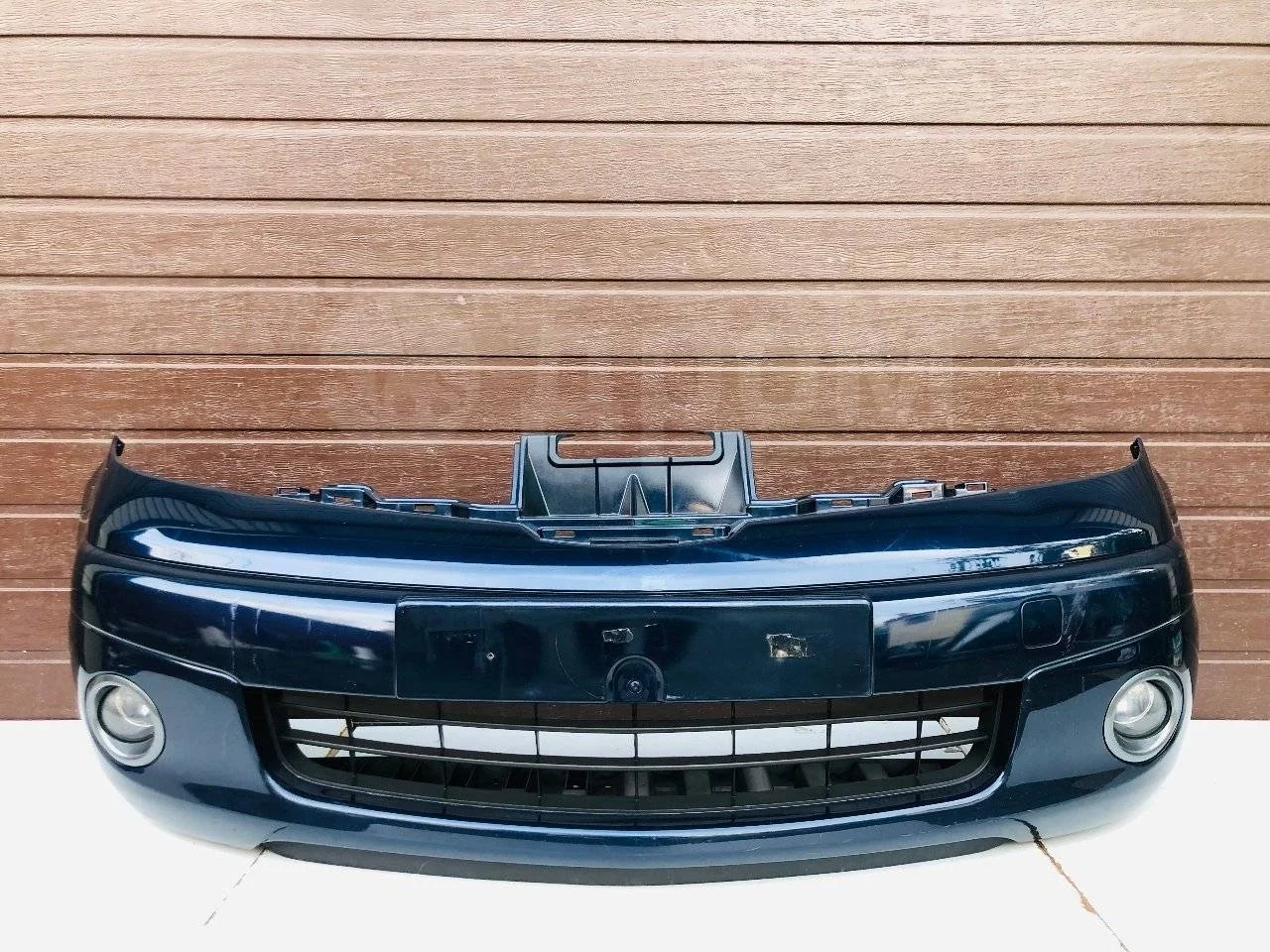 Бампер передний Nissan Note E11 (2005—2009)