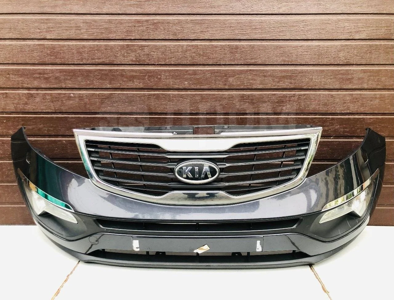 Бампер передний Kia Sportage III (2010—2014)