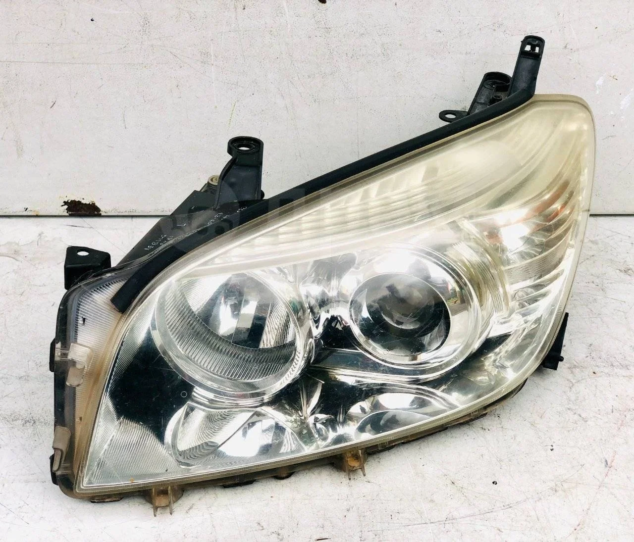 Фара левая Toyota RAV4 III (2005—2010)