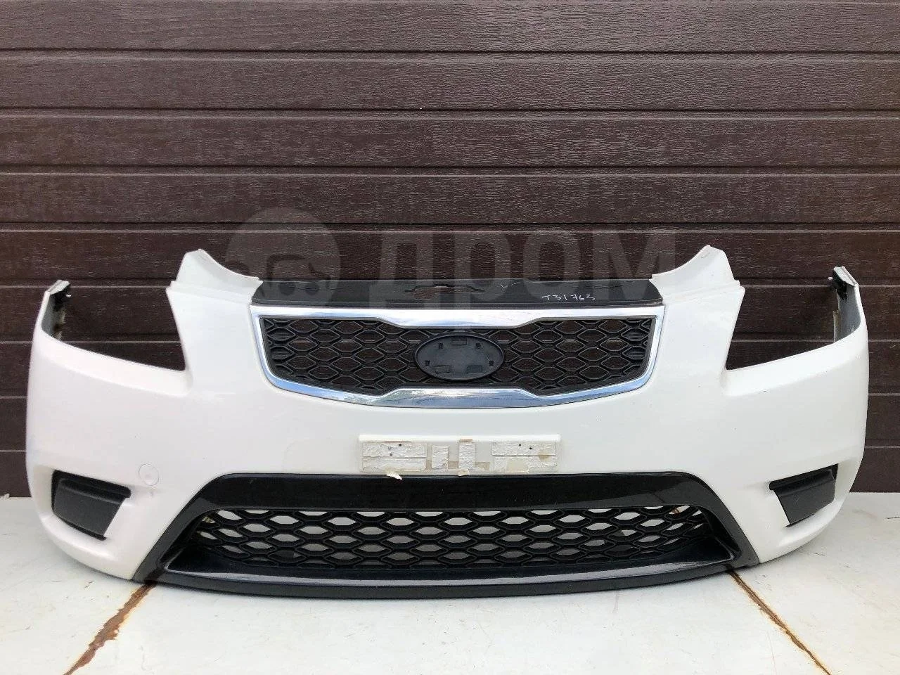 Бампер передний Kia Rio II рестайлинг (2009—2011)