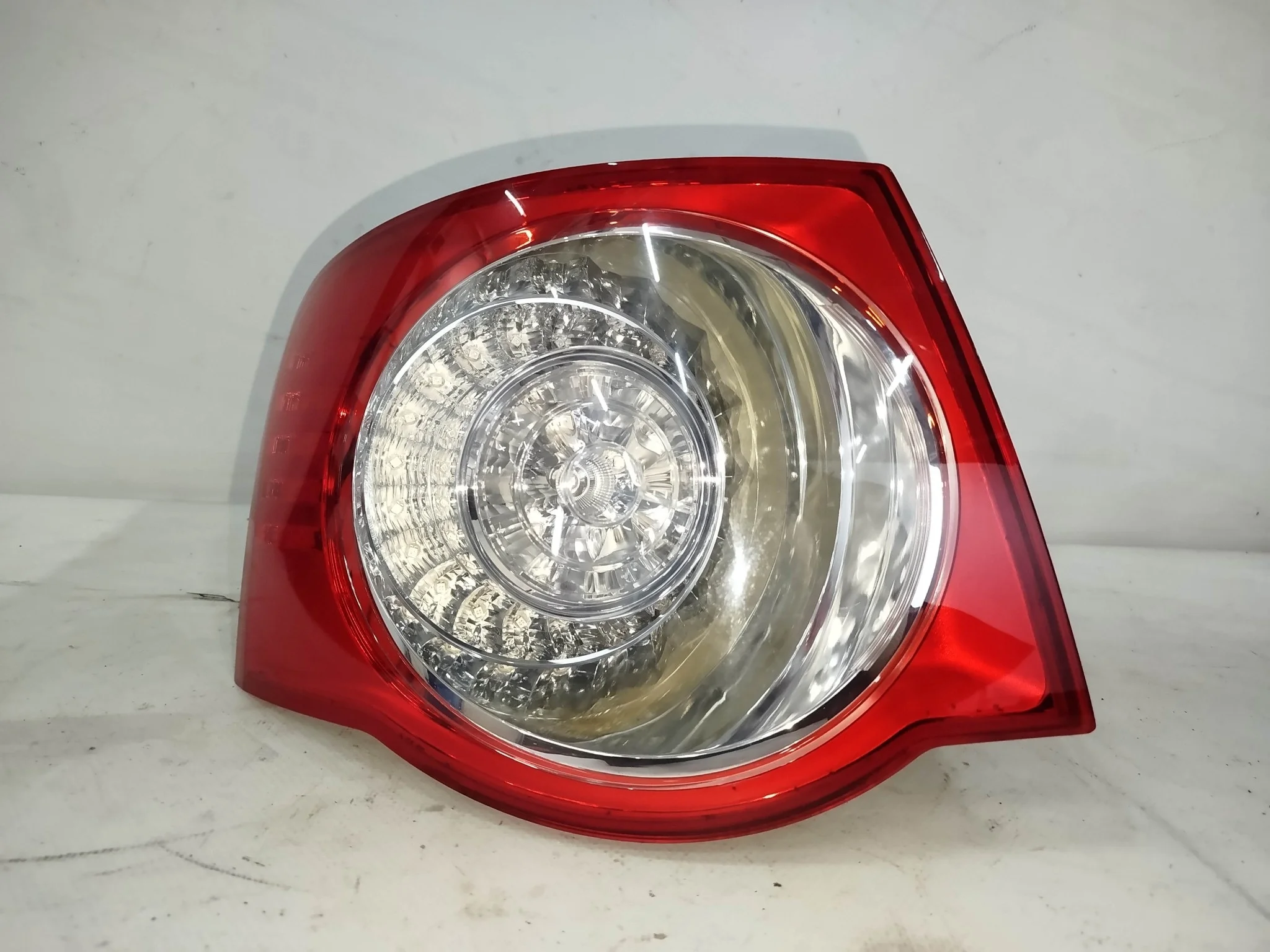 ФОНАРЬ VOLKSWAGEN ЛЕВО 1K5945095M NA7348