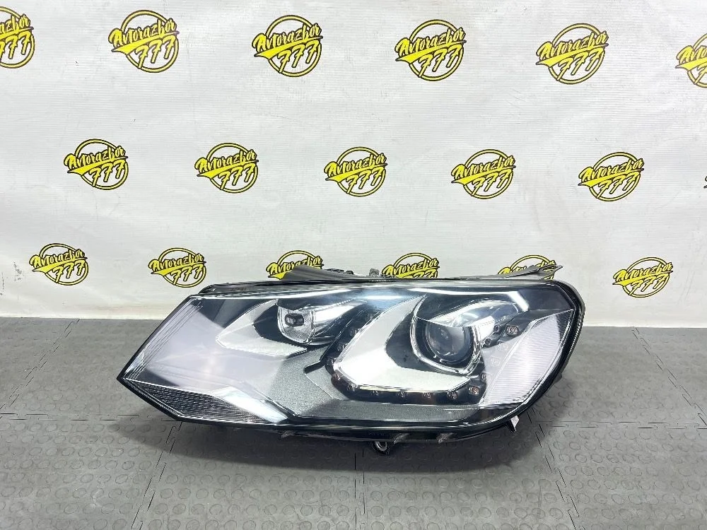 Фара левая Volkswagen Touareg II (2010—2014)