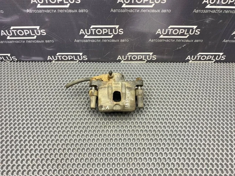 Суппорт тормозной Mitsubishi Lancer 2007 MR955065 СЕДАН 4G13, задний левый