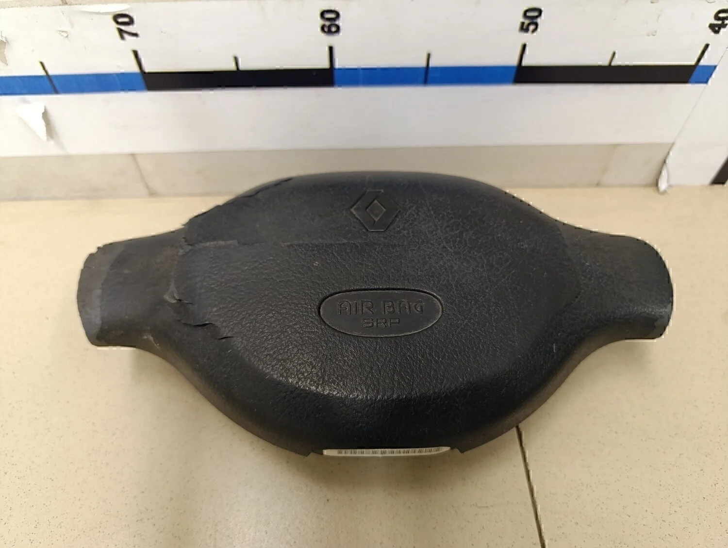 Подушка безопасности в рулевое колесо Logan 2005-2014