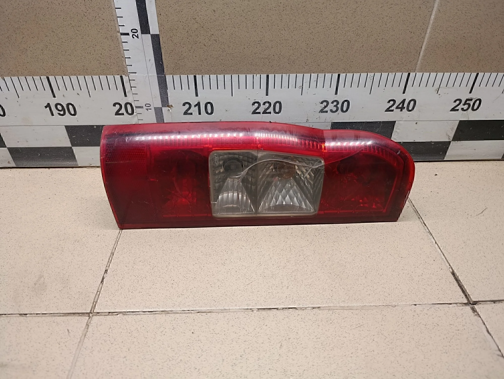 Фонарь задний левый Transit 2006-2013