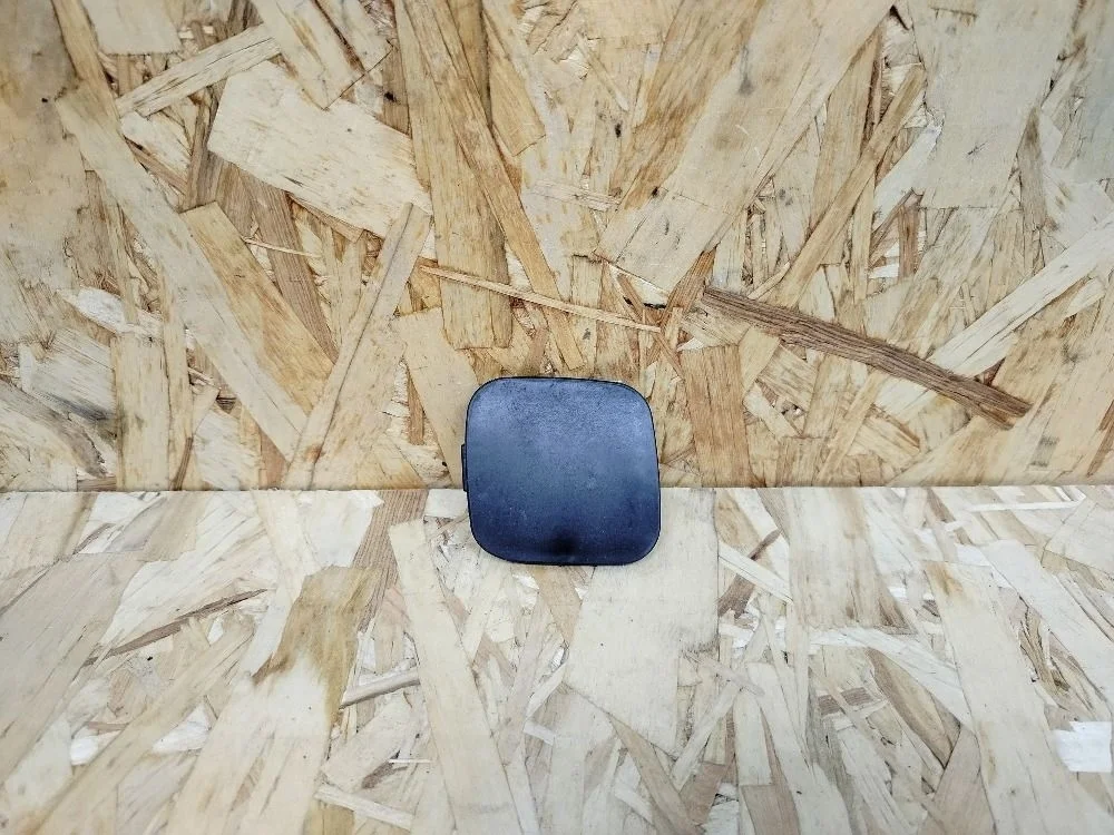 Заглушка буксир. крюка перед. прав. Toyota Corolla X рестайлинг (2010—2013) 5212712909