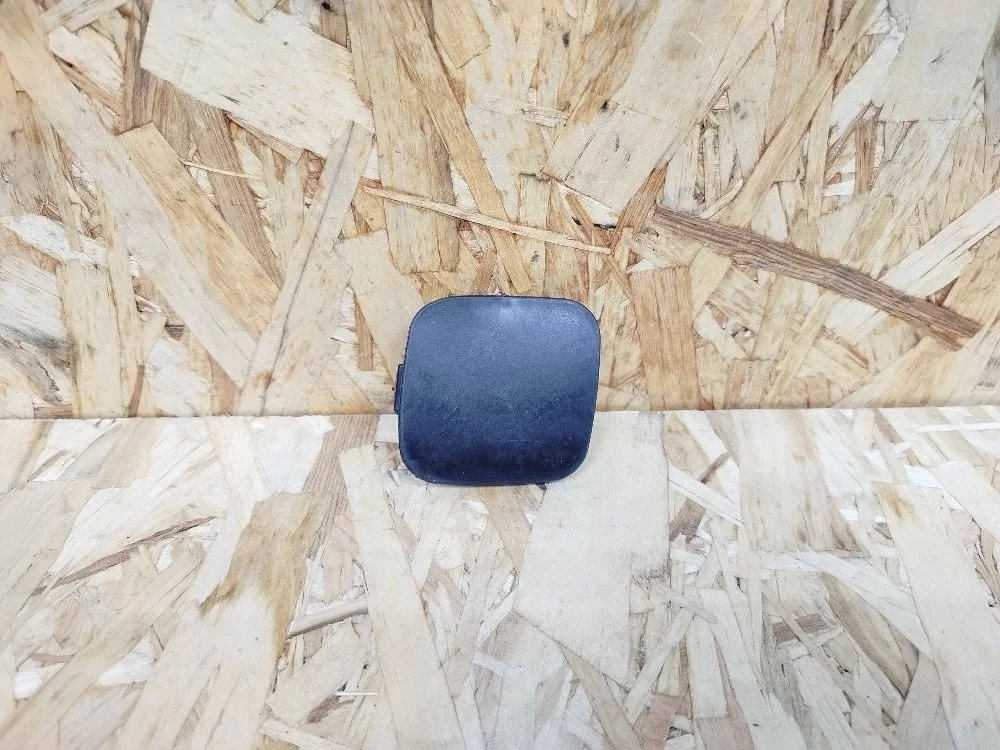 Заглушка буксир. крюка перед. лев. Toyota Corolla X рестайлинг (2010—2013) 5212812911