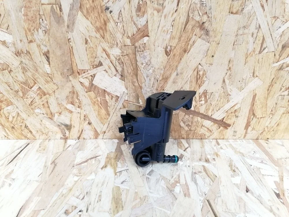 Форсунка омывателя фары прав. Toyota Corolla X (2006—2010) 8520702040