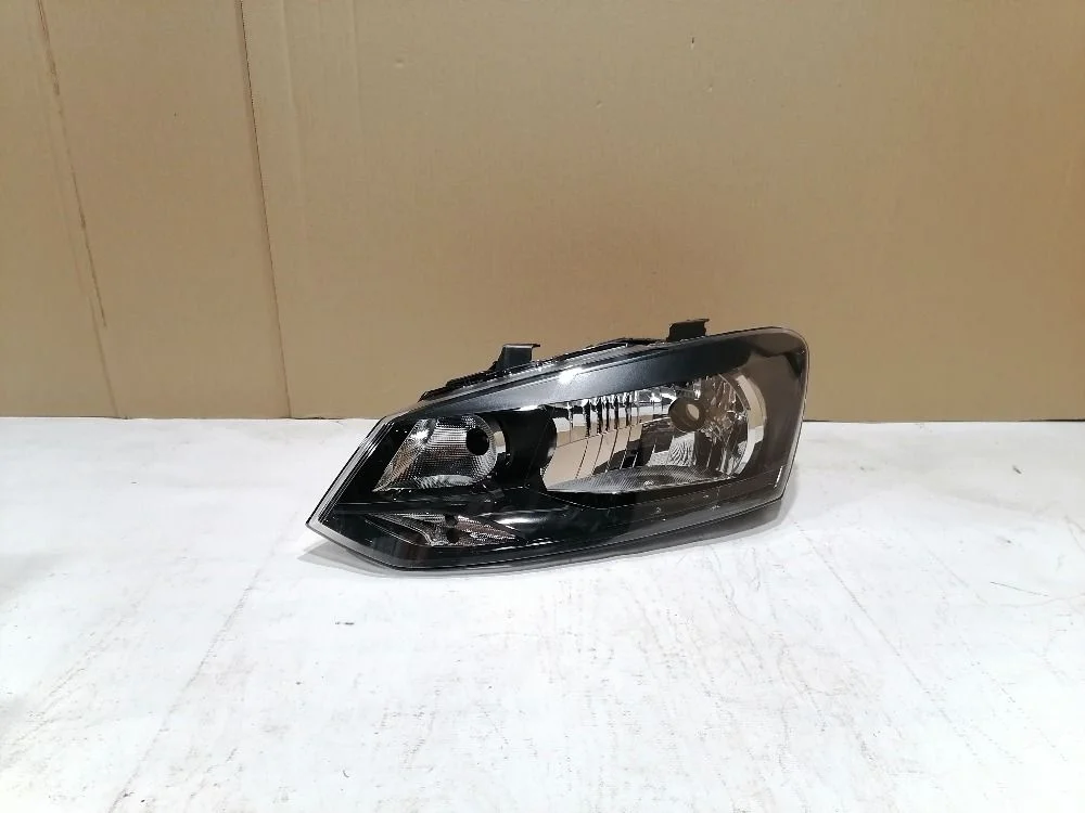 Фара левая Volkswagen Polo V (2009—2015)