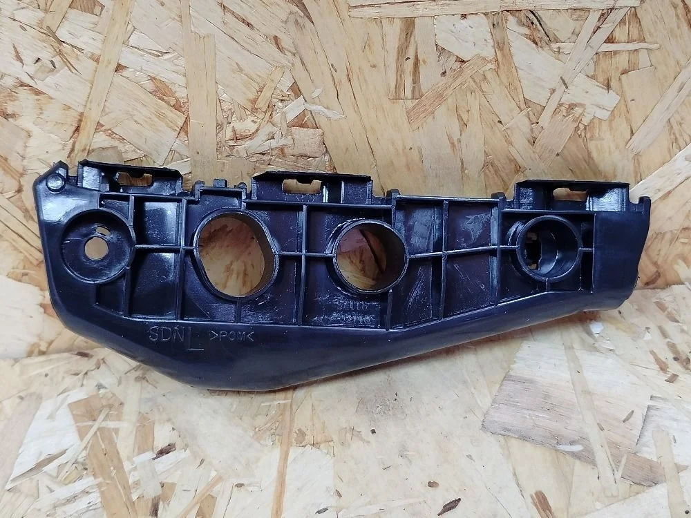 Кронштейн бампера пер. лев. Toyota Corolla X (2006—2010) 5211602100