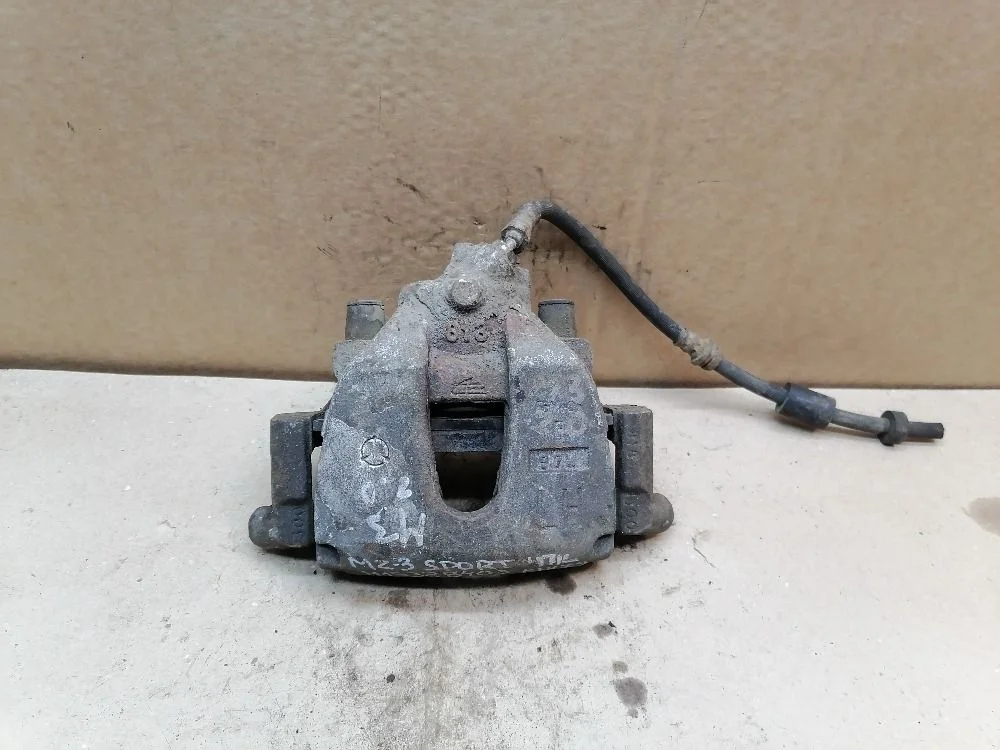 Суппорт тормозной передний левый Mazda 3 BK рестайлинг (2006—2009) BPYK3371XA