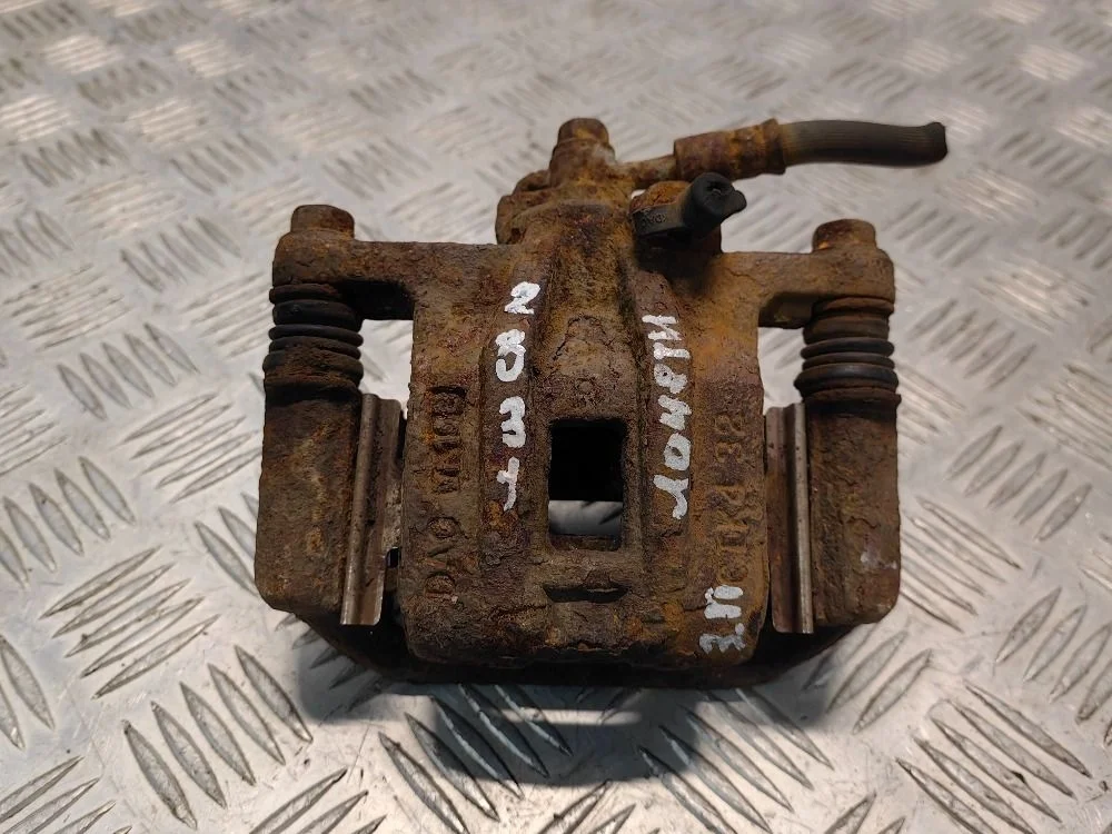 Суппорт тормозной задний правый Chevrolet Lacetti