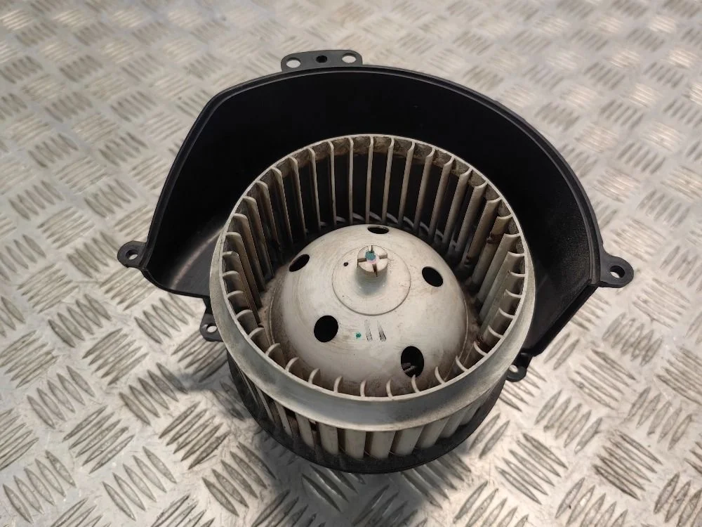 Моторчик отопителя Opel Astra H