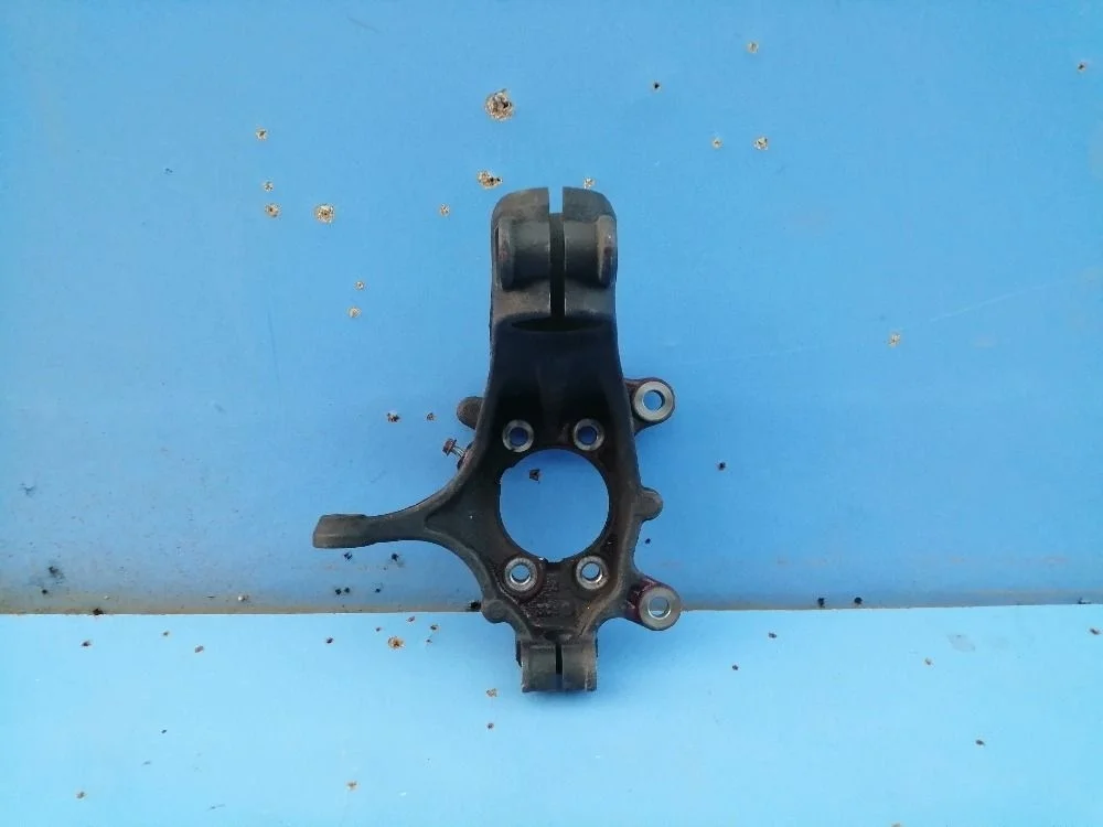 Кулак поворотный пер. лев. Nissan X-Trail III (2013—2019) 400154CE0A