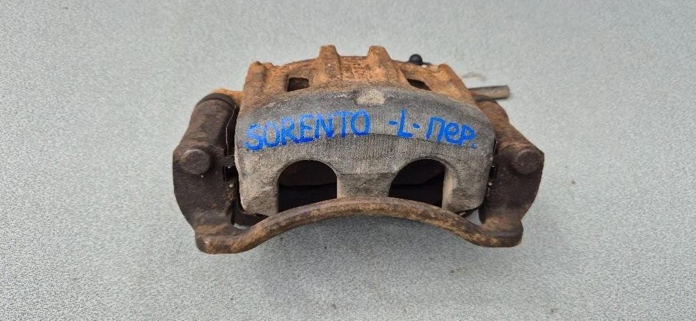 Суппорт тормозной передний левый для Kia Sorento 1