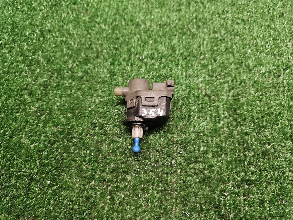 Моторчик корректора фары Renault Logan