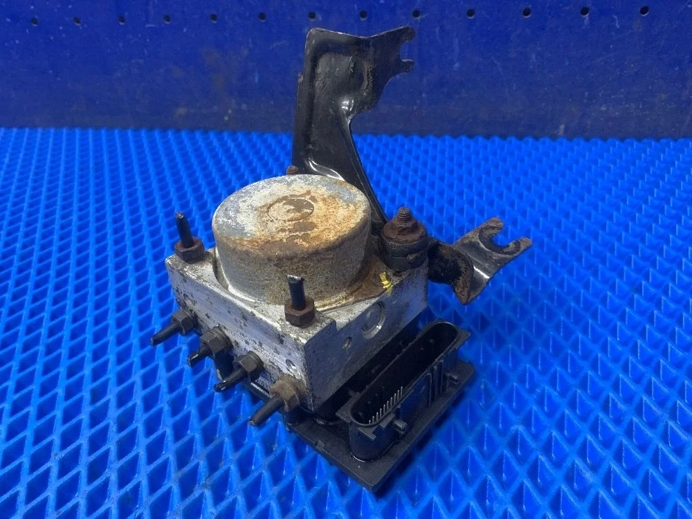 Блок ABS (насос) Nissan Micra K12 (2002—2010) б.у