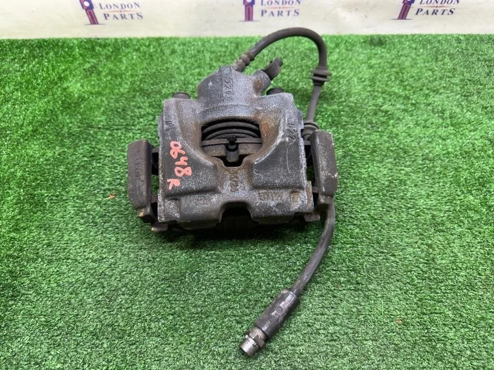 Суппорт тормозной BMW 320i E90