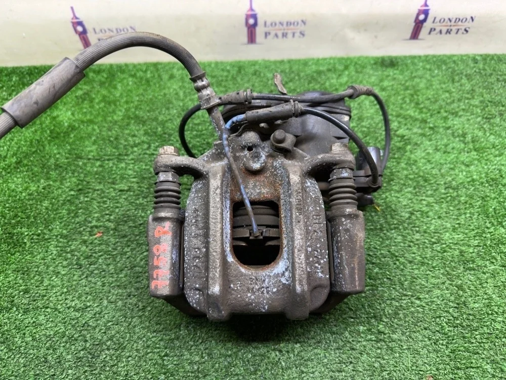 Суппорт тормозной BMW 520D F10