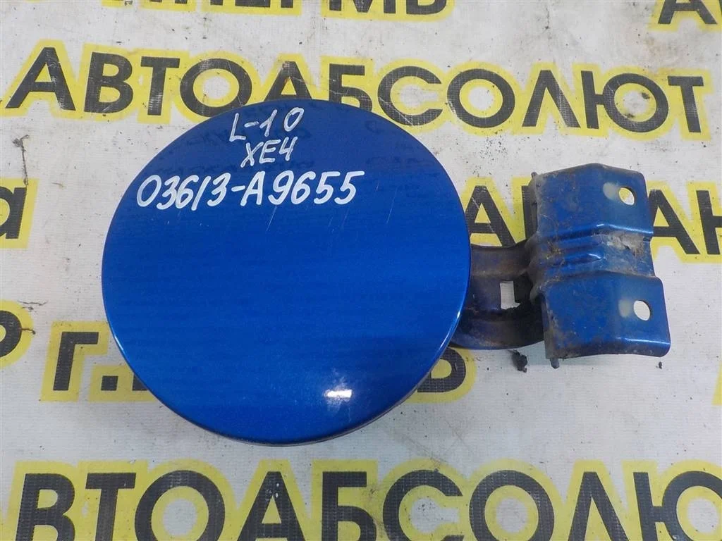 Лючок бензобака Mitsubishi Lancer X (2007—2010)