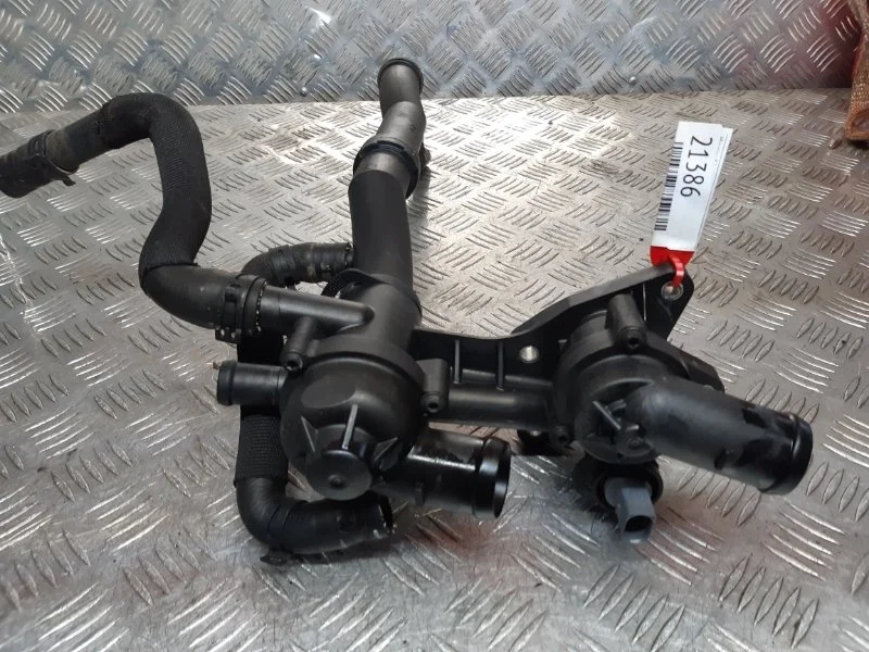 Термостат в сборе корпусом Volkswagen Touran