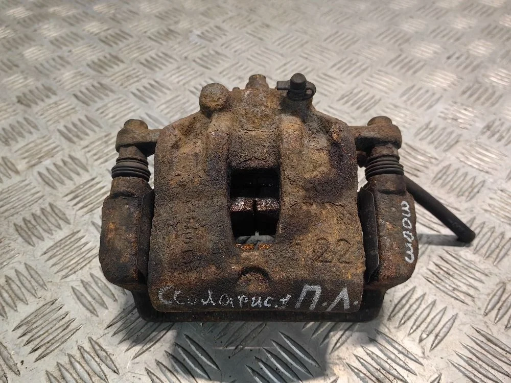 Суппорт передний левый Hyundai Solaris