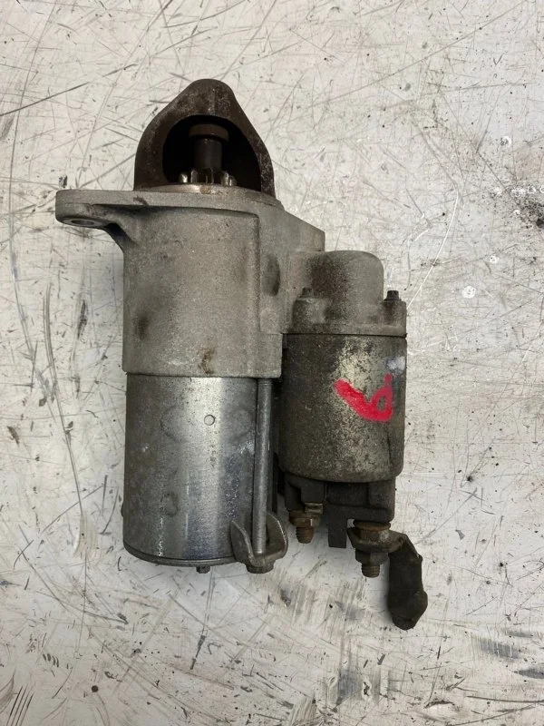 Стартер Opel Astra J 55576980 A16XER