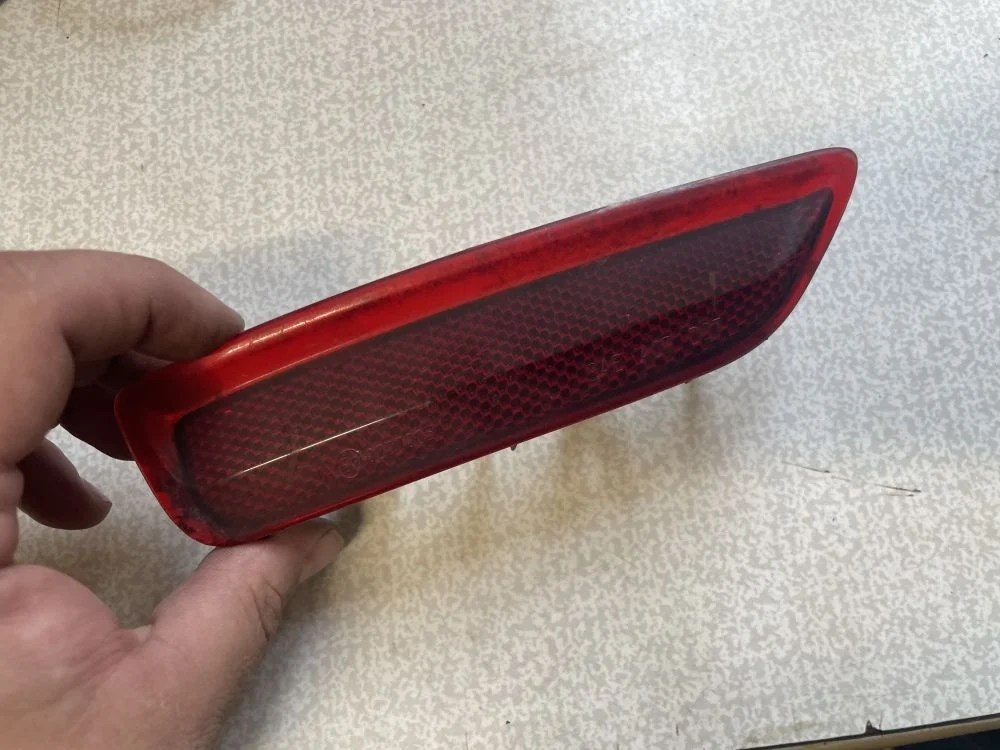 катафот заднего бампера левый opel astra H GTC