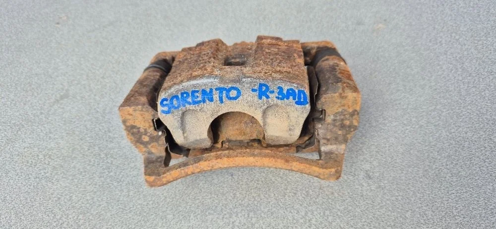 Суппорт тормозной задний правый для Kia Sorento 1