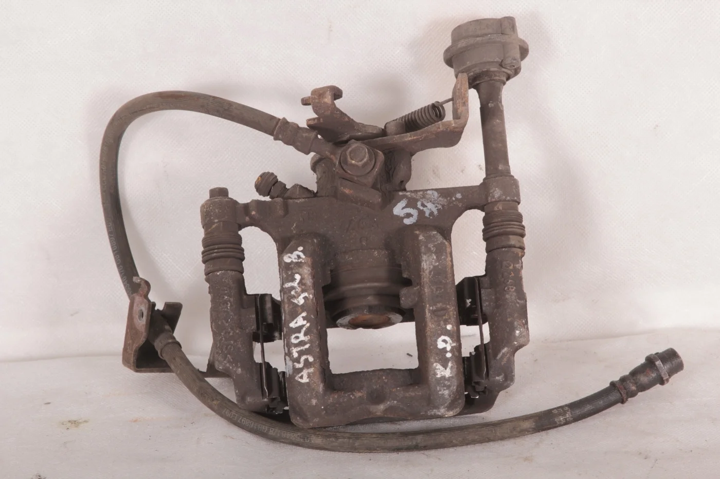 Суппорт задний Lh 268 мм эл. ручник Опель Астра J