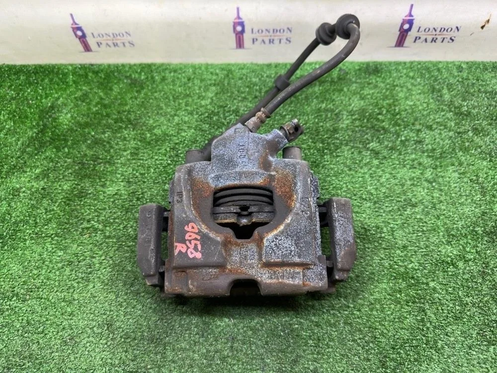 Суппорт тормозной BMW 320i E90