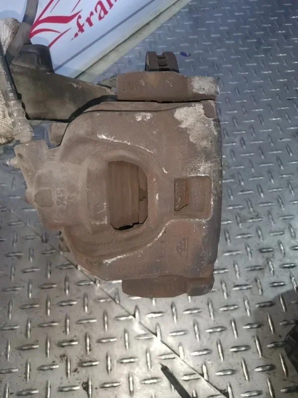 Суппорт тормозной Ford Mondeo 2007-2014 1583140 4, передний левый