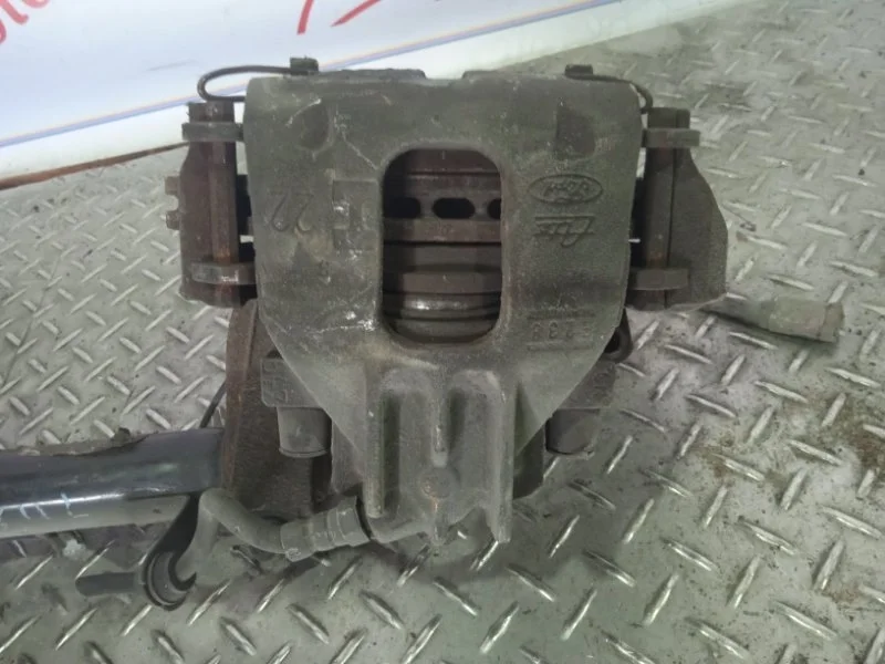 Суппорт тормозной Ford Focus 4346373 1, передний левый