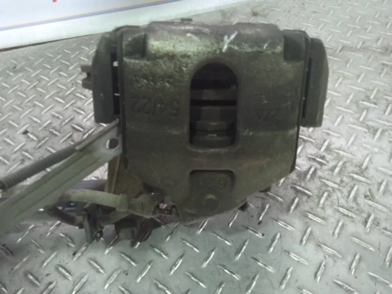 Суппорт тормозной Ford Fiesta 1478500, передний левый