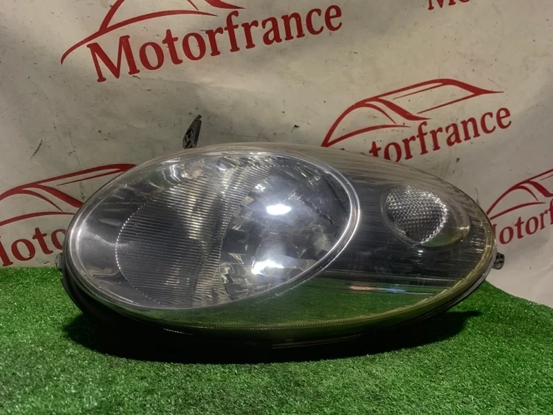 Фара галогеновая NISSAN Micra 26010AX700 K12, правая