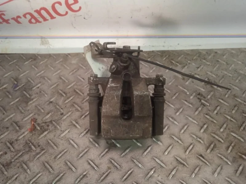 Суппорт тормозной Renault Megane 7701049108 2, задний левый