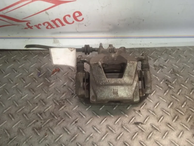 Суппорт тормозной Chevrolet Cruze 13301190 1, передний правый