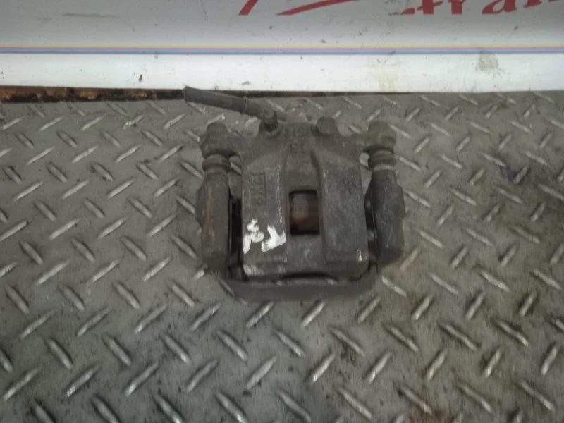 Суппорт тормозной Nissan X-trail 440118H30A T30, задний левый