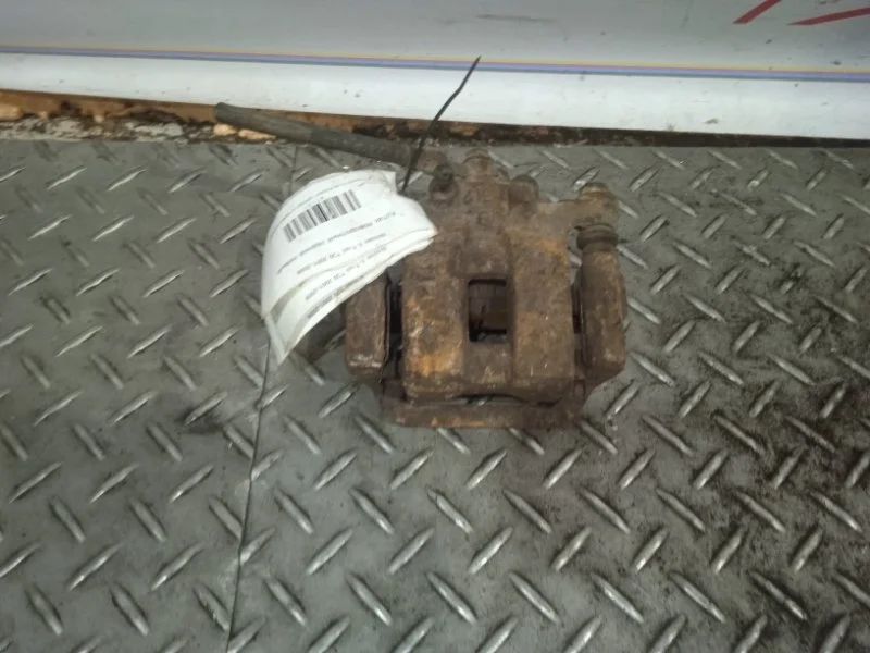 Суппорт тормозной NISSAN X-trail 440118H30A T30, задний левый