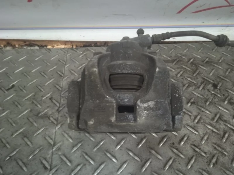 Суппорт тормозной Ford Mondeo 1583140 4, передний левый