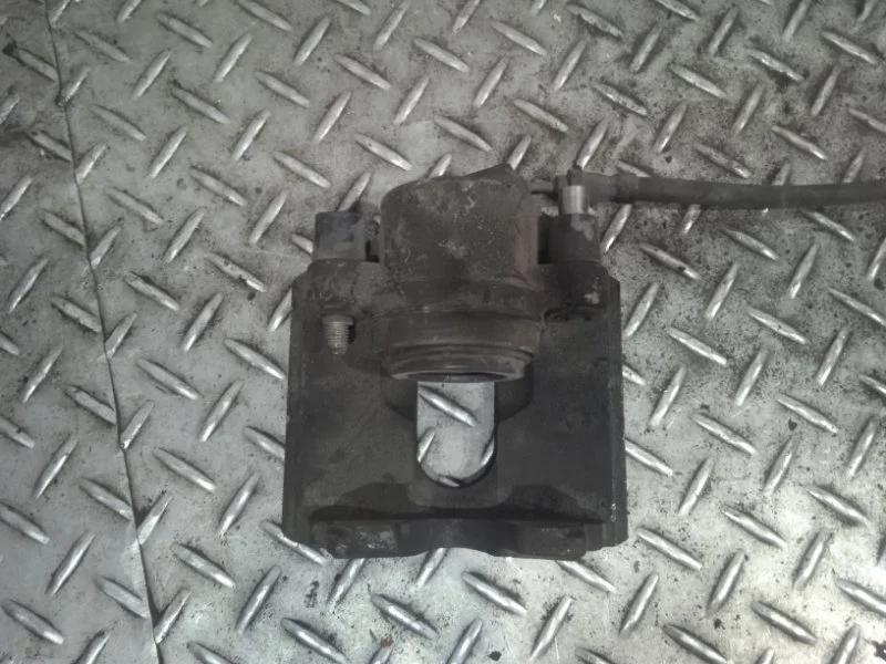 Суппорт тормозной Ford Fusion 1478474, передний правый