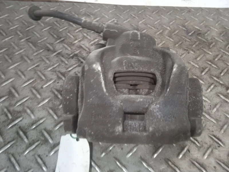 Суппорт тормозной Ford Mondeo 1583139 4, передний правый