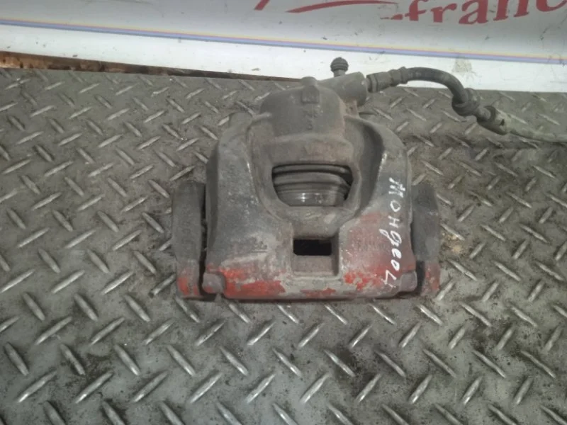 Суппорт тормозной Ford Mondeo 1583140 4, передний левый