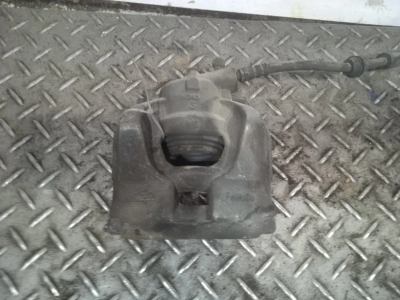 Суппорт тормозной Ford Mondeo 1583140 4, передний левый