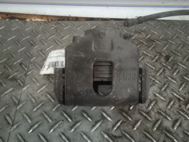 Суппорт тормозной Ford Fusion 1478500, передний левый