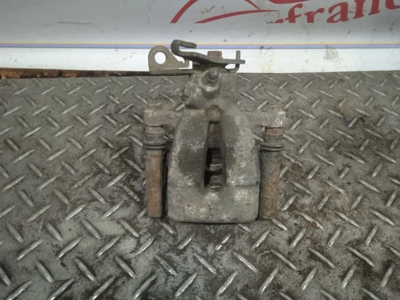 Суппорт тормозной Renault Megane 7701049108 2, задний левый